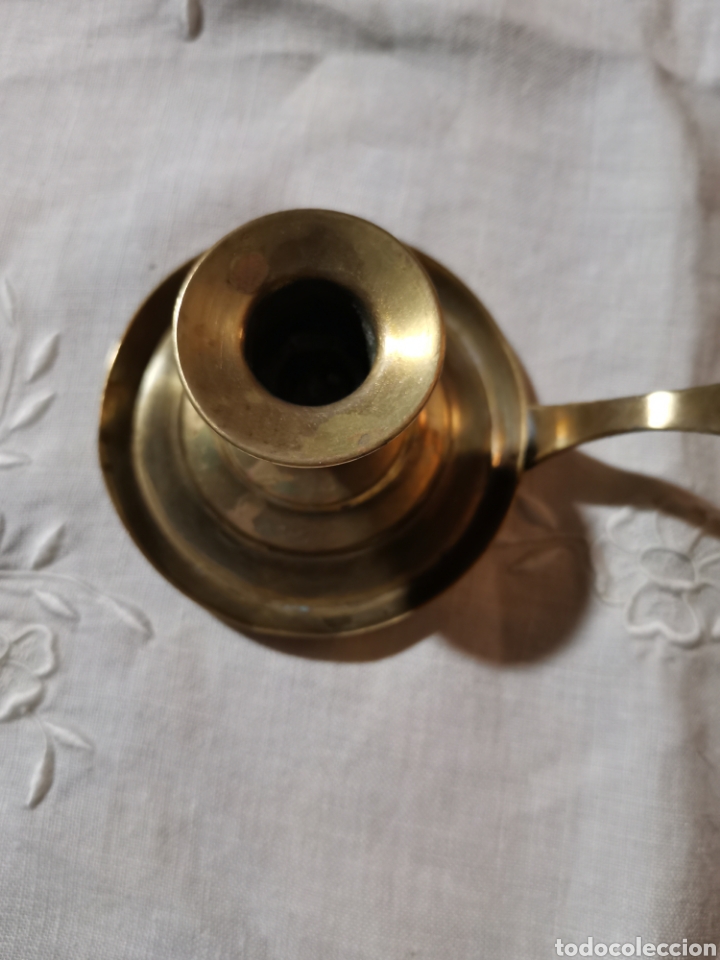 Antig&uuml;edades: Palmatoria antigua de bronce.