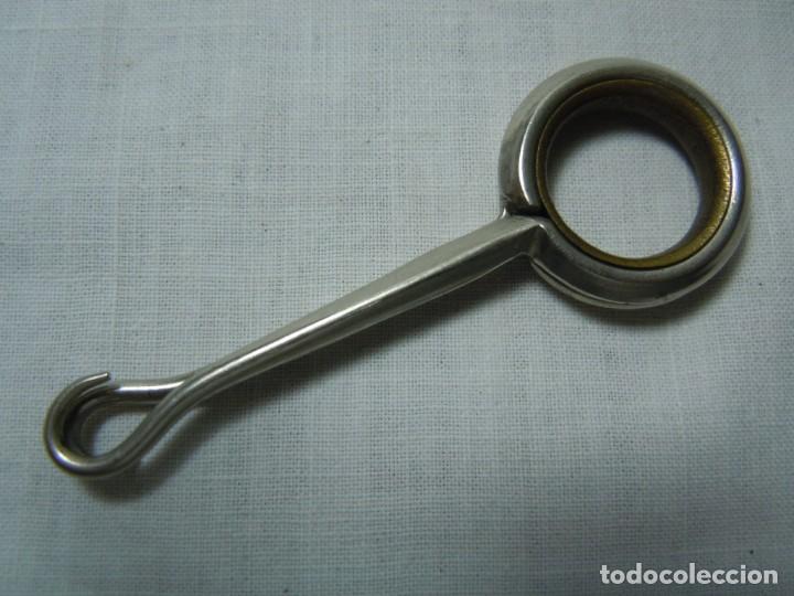 Antig&uuml;edades: ABROCHABOTONES PLEGABLE - Foto 1
