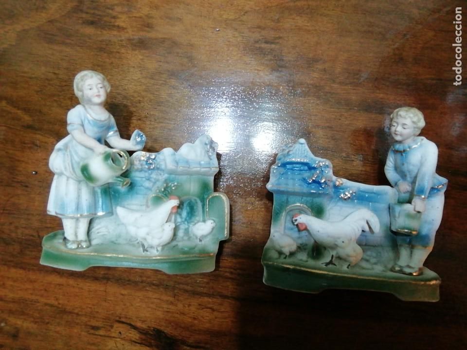 Antig&uuml;edades: *PAREJA DE BISCUITS CON JARDINERA.(Rf:TV/*c) - Foto 1