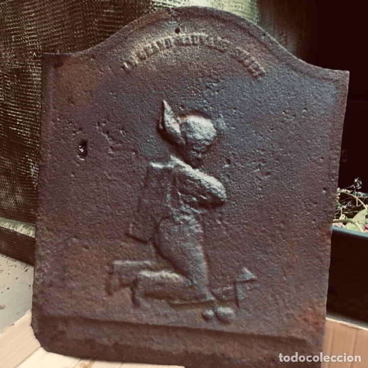 Antiquit&auml;ten: Placa de hierro para chimenea 1940s