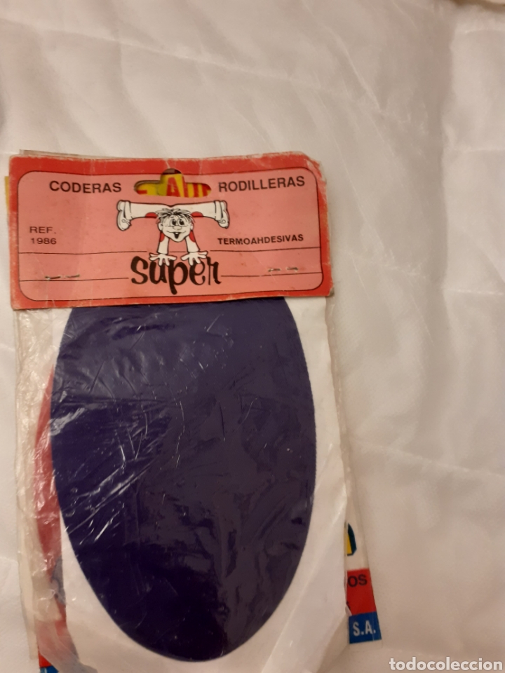 Antig&uuml;edades: Lote de 5 bolsas de coderas termoadheivas. - Foto 4