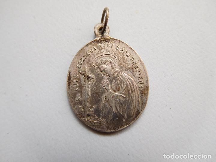 Antiguidades: Medalla antigua de plata de San Luis Gonzaga