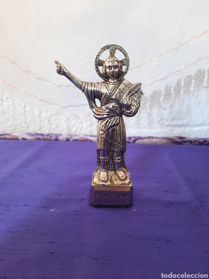 Antiques: San Pancracio en metal 14 cm altura.