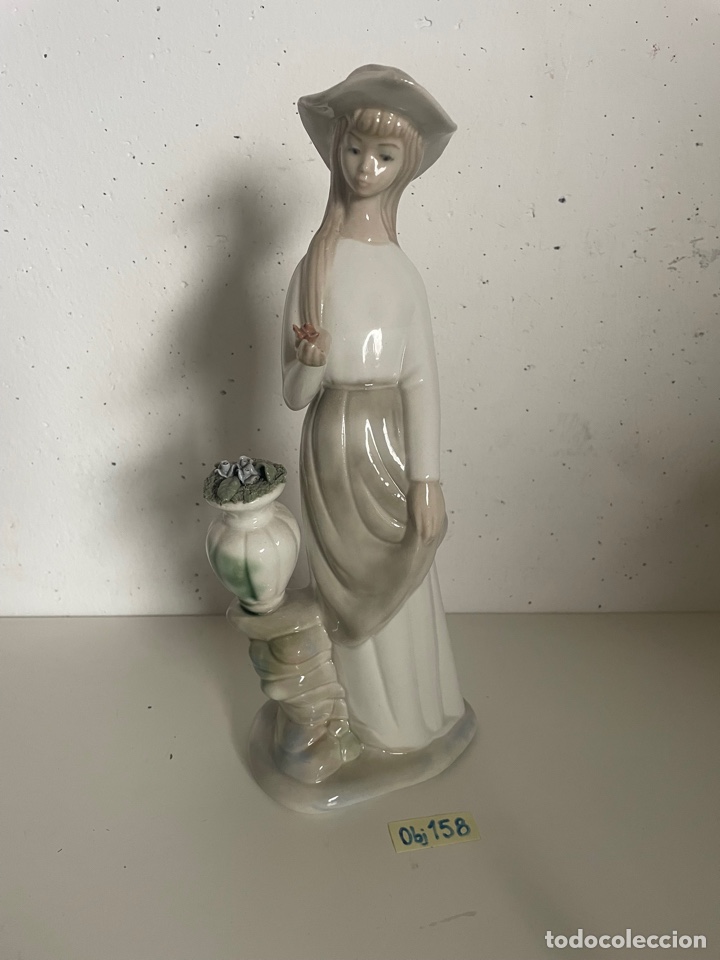 Antig&uuml;edades: Figura de porcelana porman - Foto 1