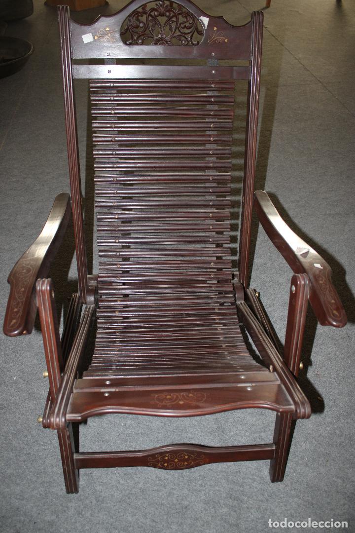 Antig&uuml;edades: sillon de madera tropical con incrustaciones de lat&oacute;n - Foto 1
