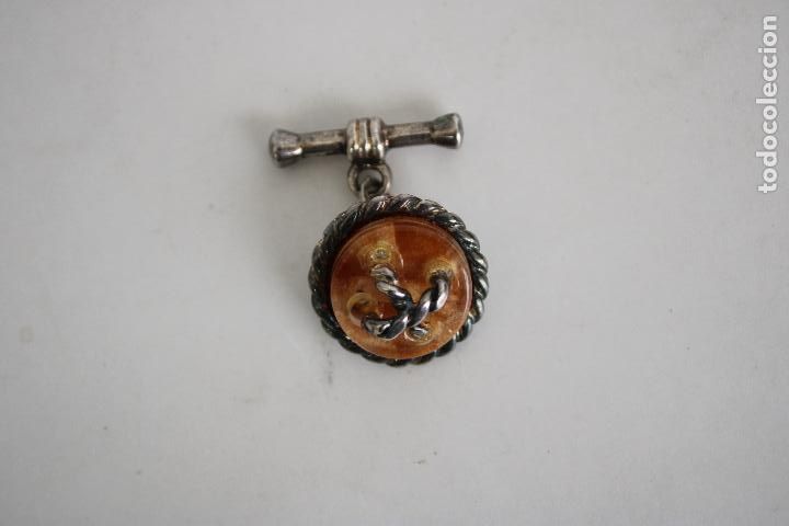 Antig&uuml;edades: bot&oacute;n de plata de ley - Foto 1