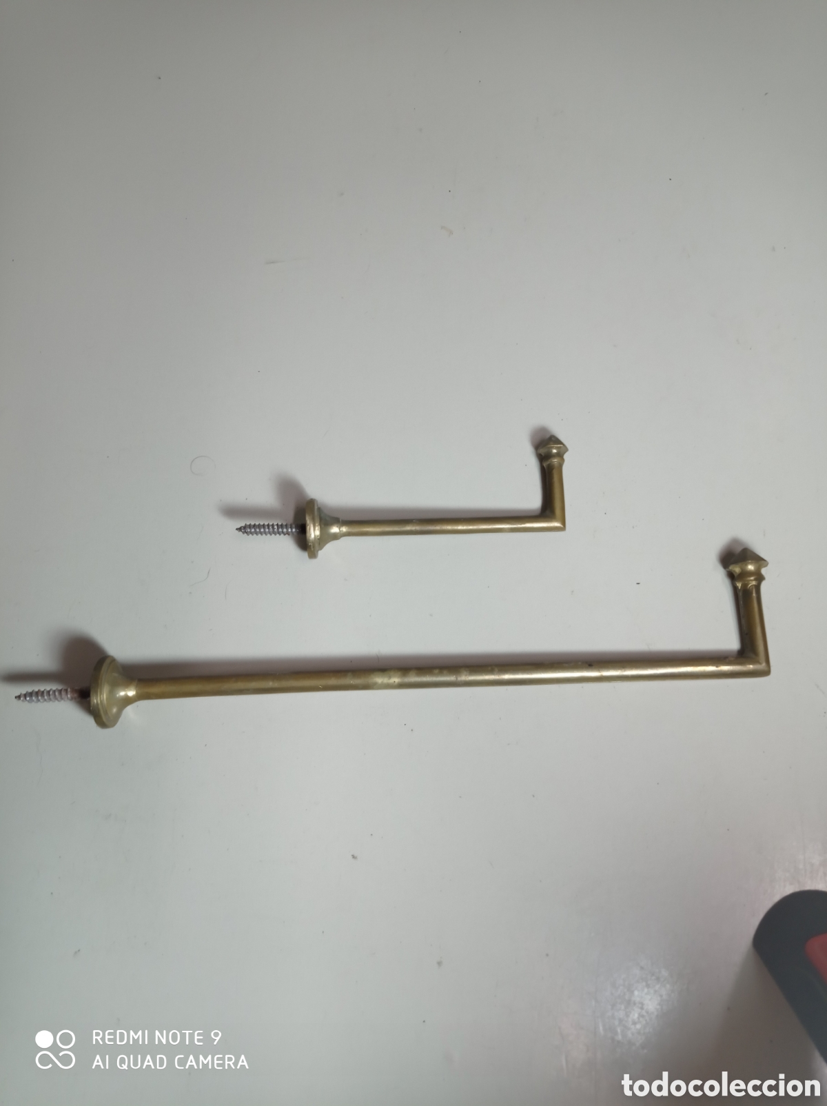 Antig&uuml;edades: Pareja de antiguos colgadores. Creo que son para las cortinas.