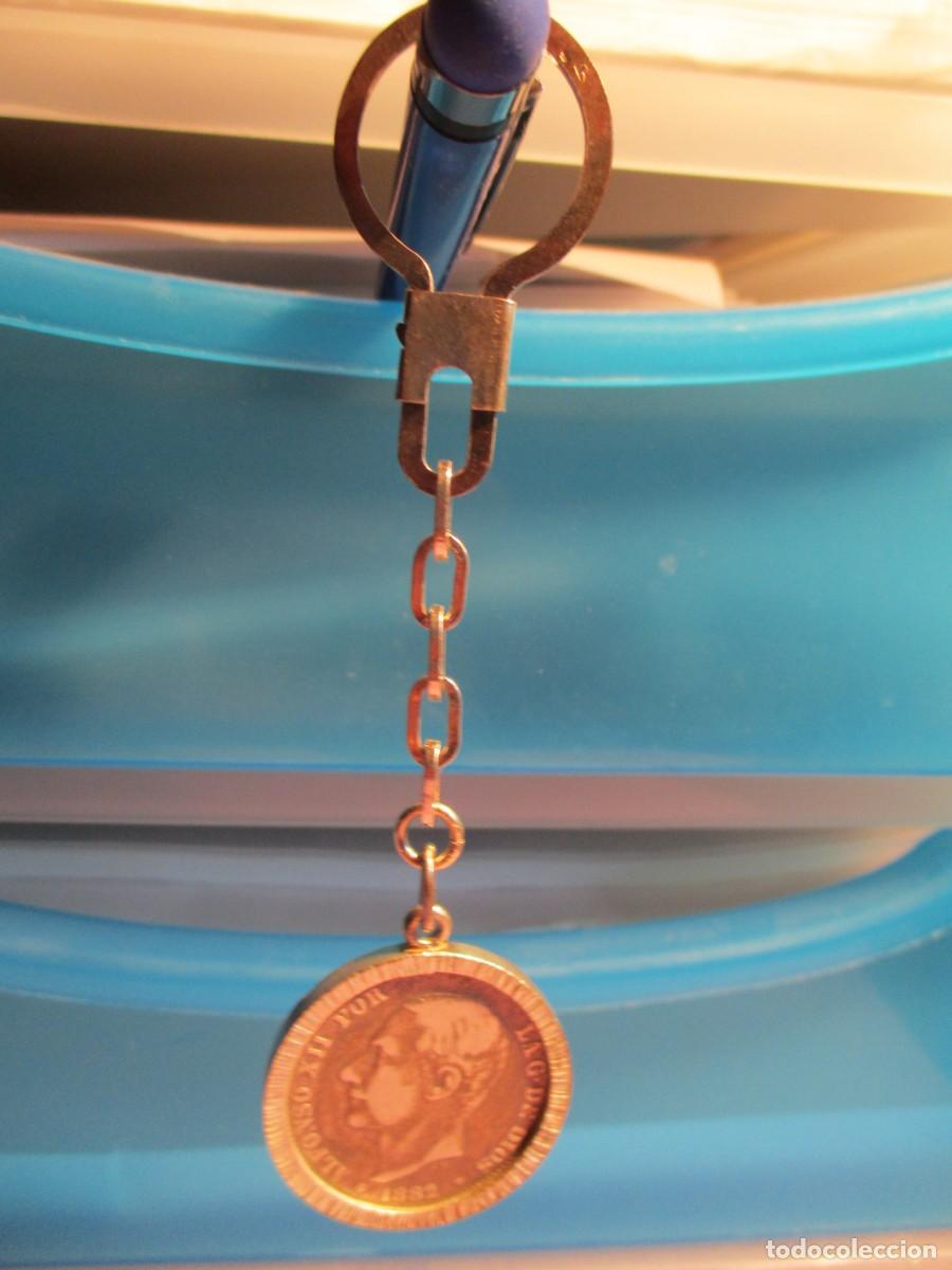 Antig&uuml;edades: Llavero con moneda plata de ley - Foto 1