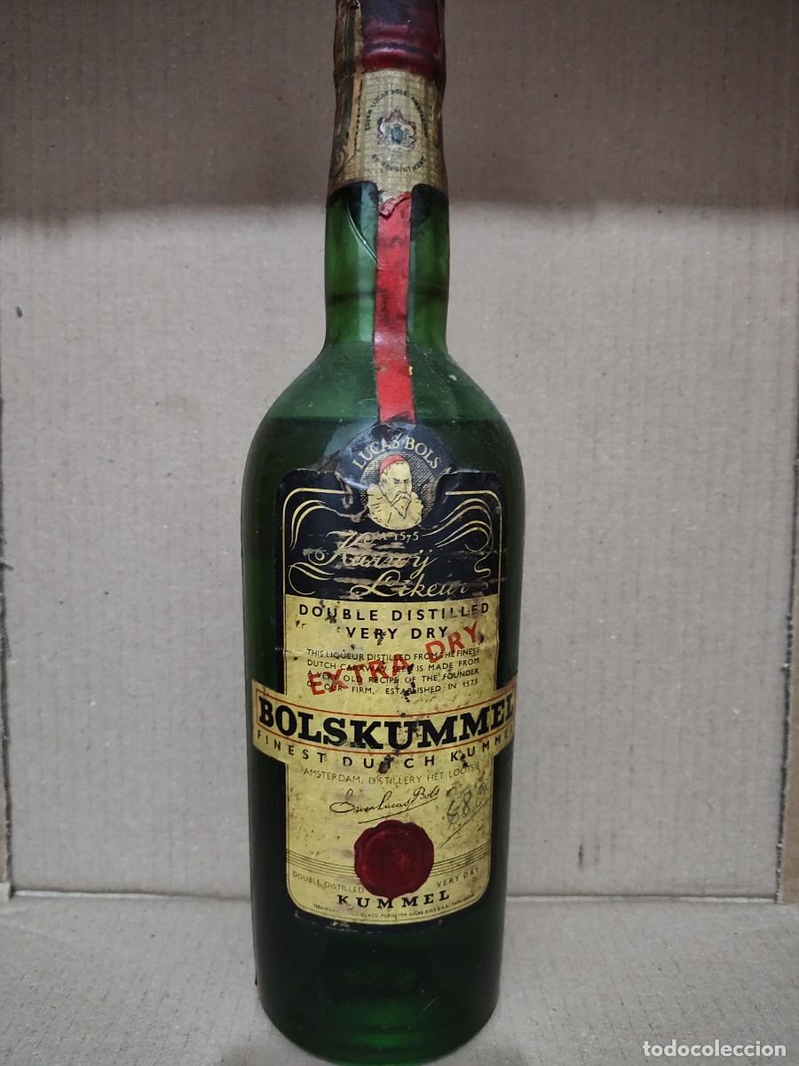 Antig&uuml;edades: botella llena de krummel licor 1940-1950
