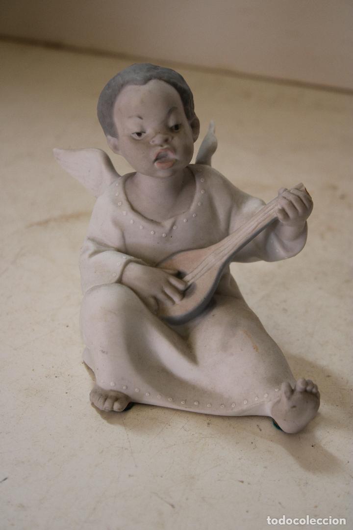 Antig&uuml;edades: &Aacute;NGEL NEGRITO CON LA&Uacute;D LLADR&Oacute; - Foto 1
