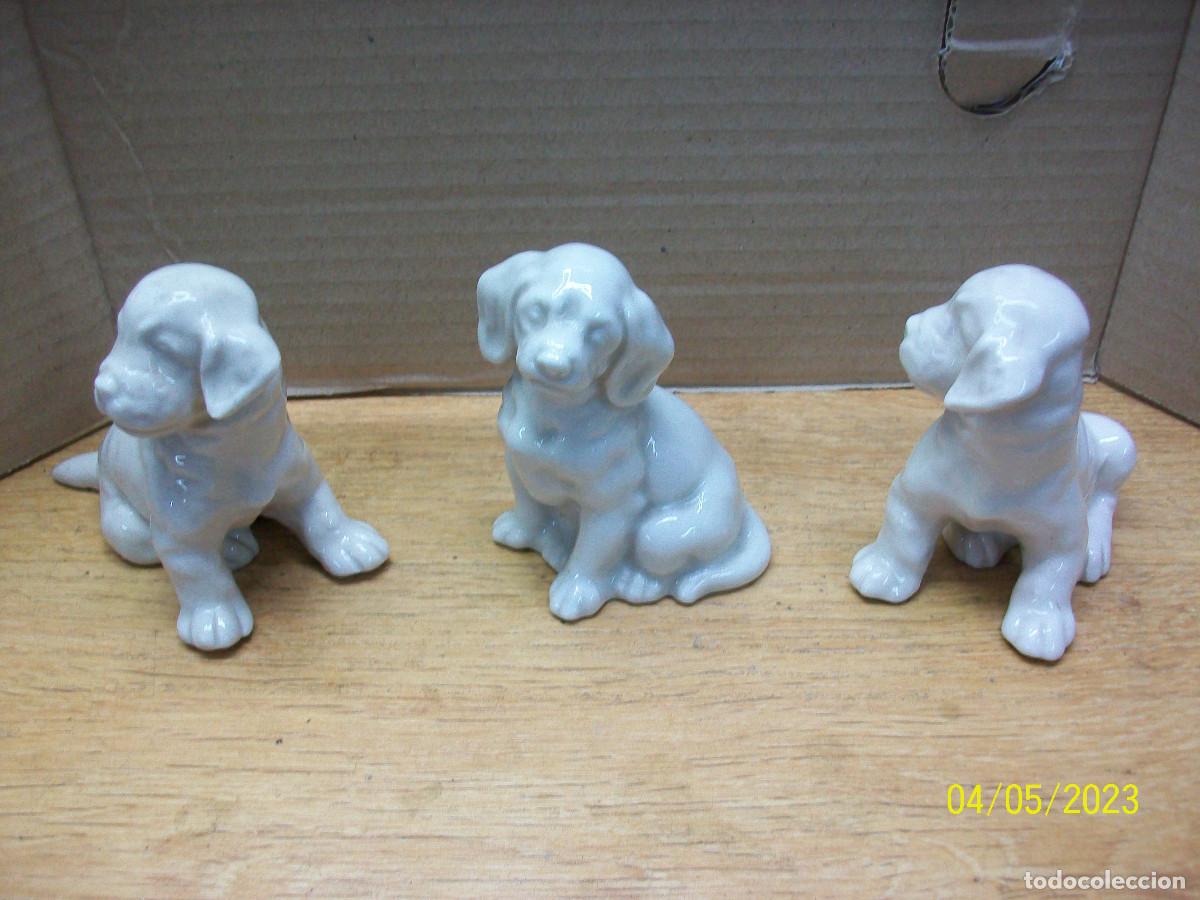 Antig&uuml;edades: LOTE DE 3 PERROS DE PORCELANA - Foto 1