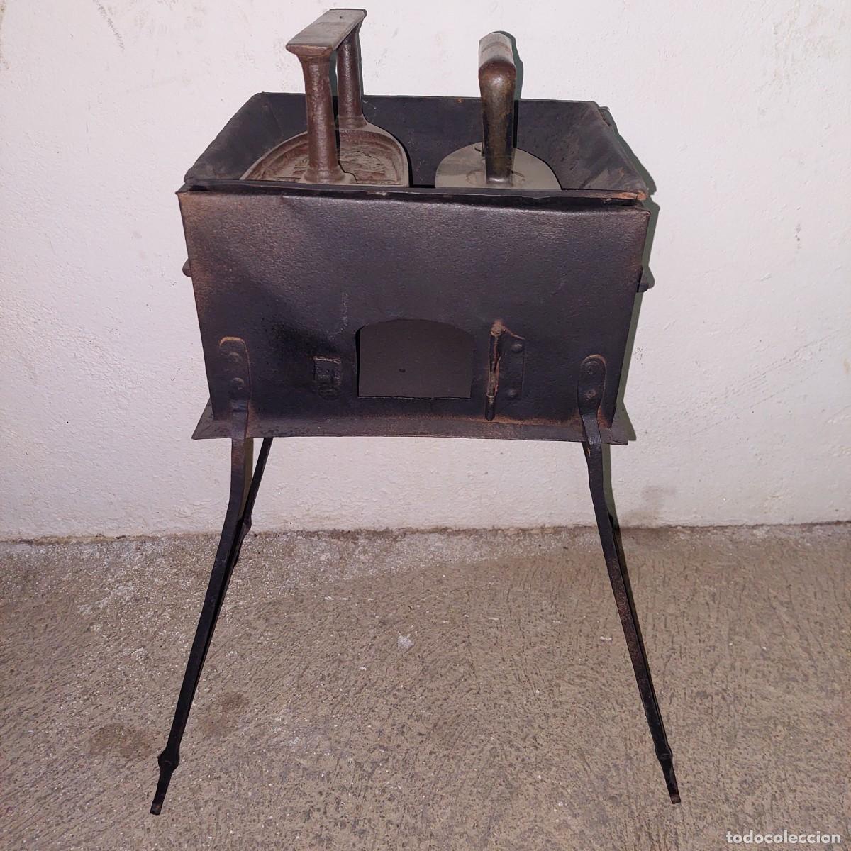 Antig&uuml;edades: Calienta planchas con planchas de hierro - Foto 1
