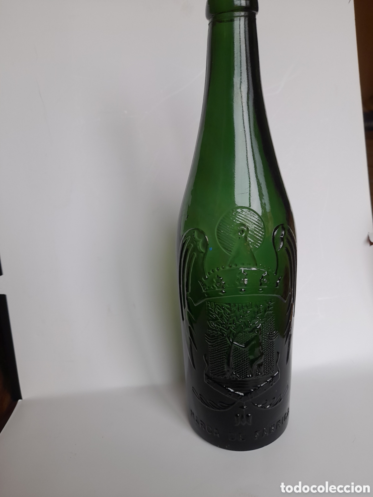 Antig&uuml;edades: Botella cerveza EL AGUILA 1 litro - Foto 1