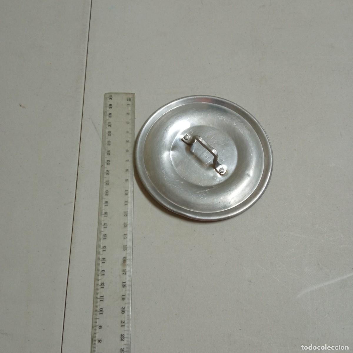 Antig&uuml;edades: Tapa de Aluminio antigua - Foto 1