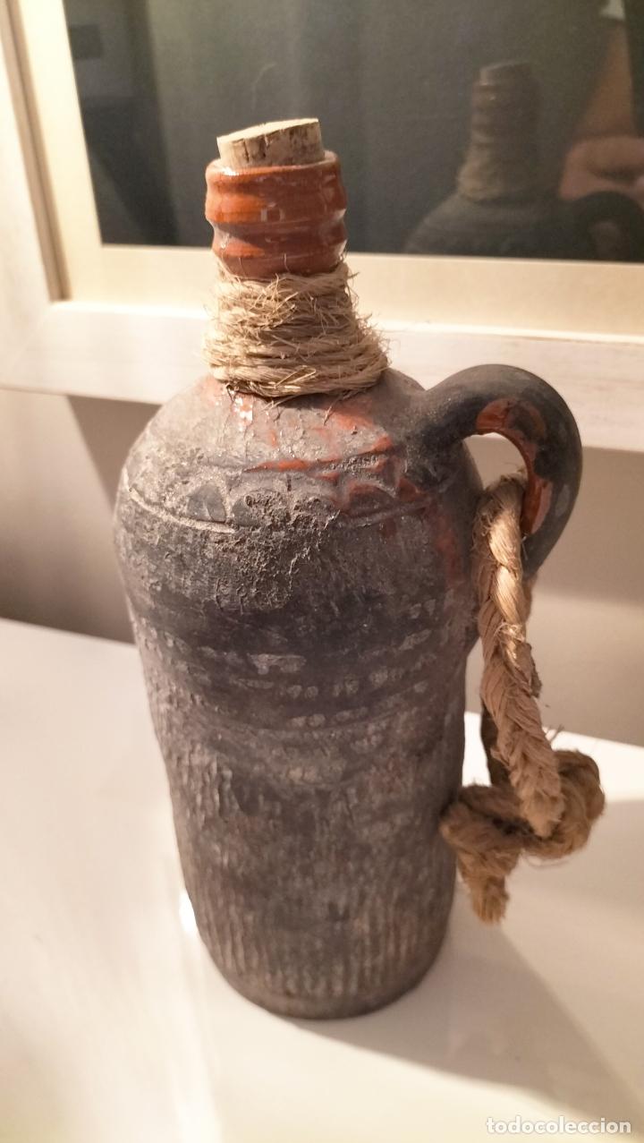 Antig&uuml;edades: CANTIMPLORA DE BARRO - Foto 1