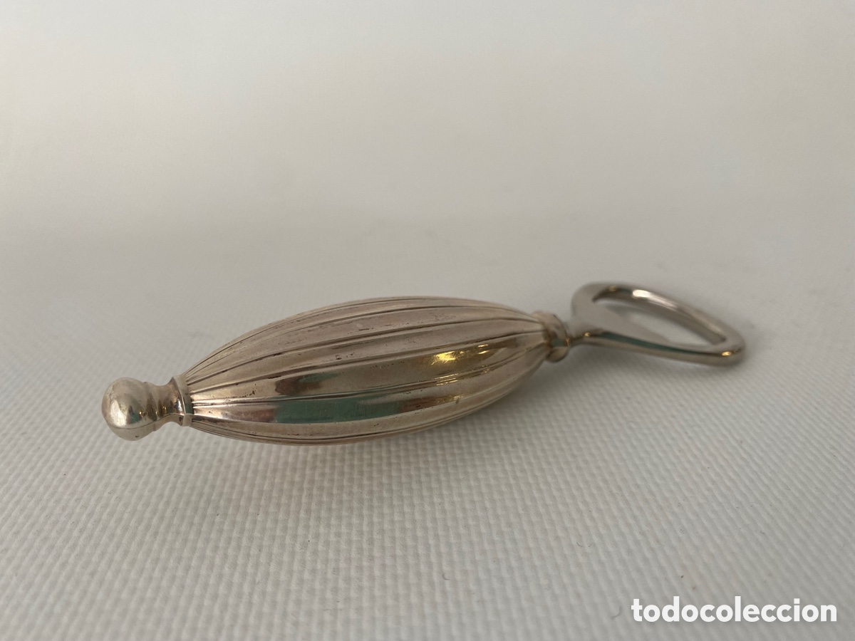 Antig&uuml;edades: Abridor abrelatas plata contrastada - Foto 2
