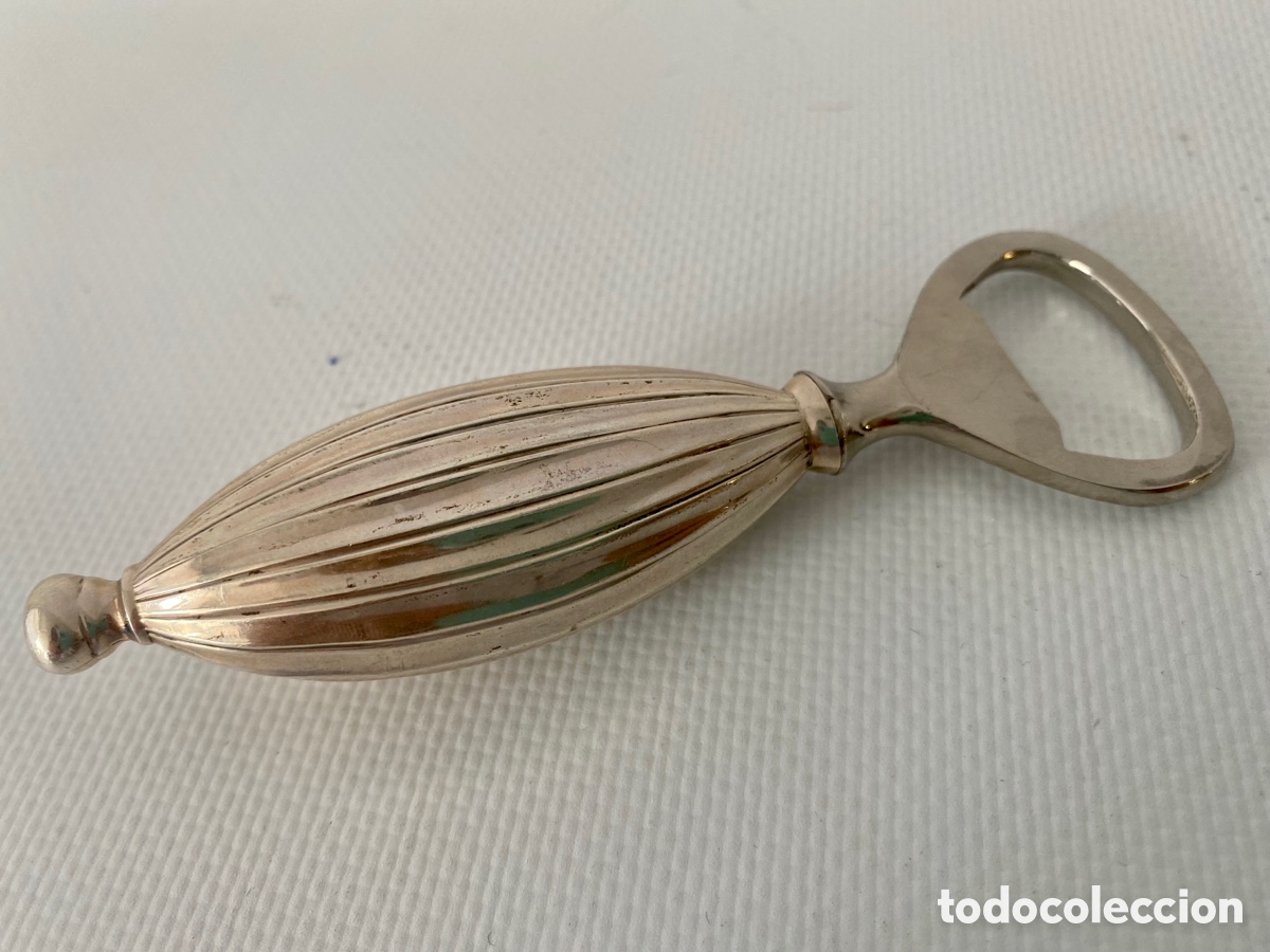 Antig&uuml;edades: Abridor abrelatas plata contrastada - Foto 1