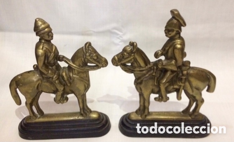 Antig&uuml;edades: Pareja reposa libros sujeta libros de bronce Primera mitad siglo XX