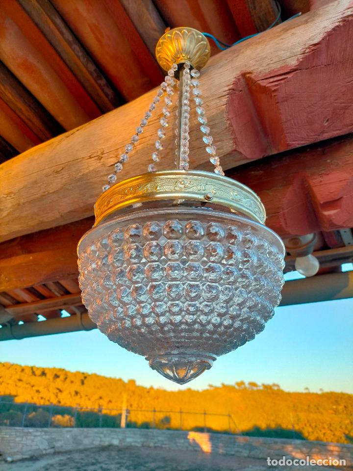 Lámpara de techo de lágrimas de cristal y latón dorado. Vintage años 60s.
