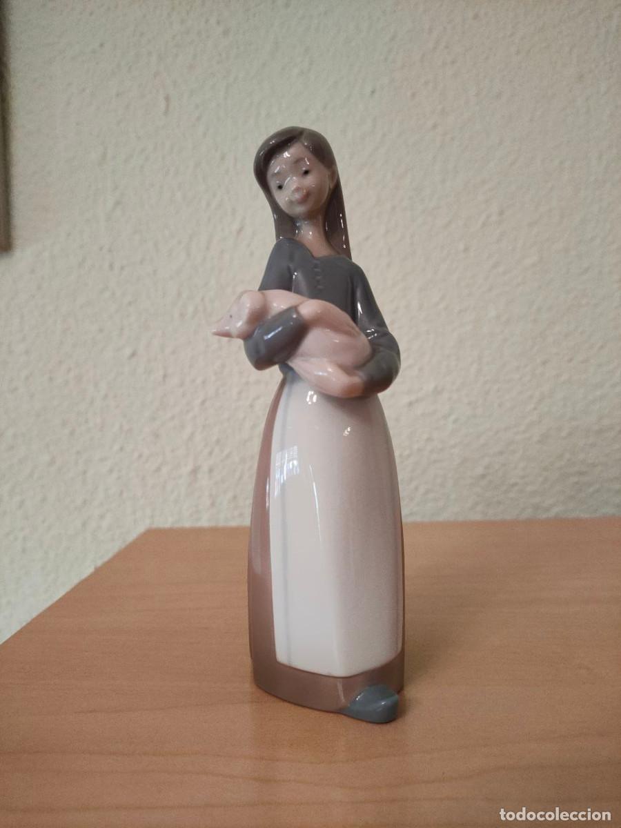 Antig&uuml;edades: Ni&ntilde;a con cerdito Lladro - Foto 1
