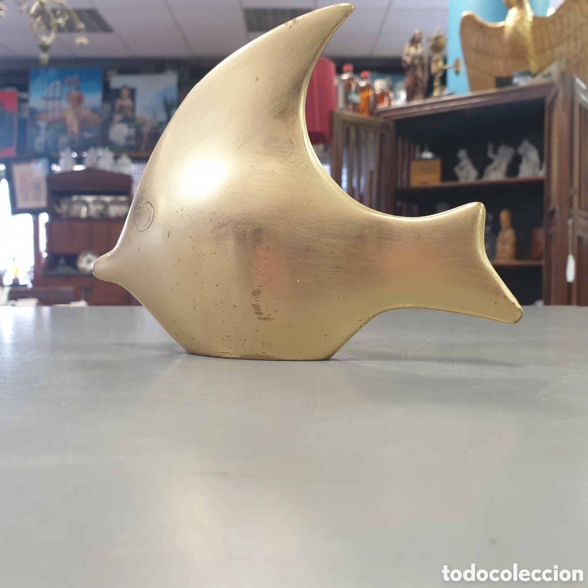 Antiques: Delfin de bronce