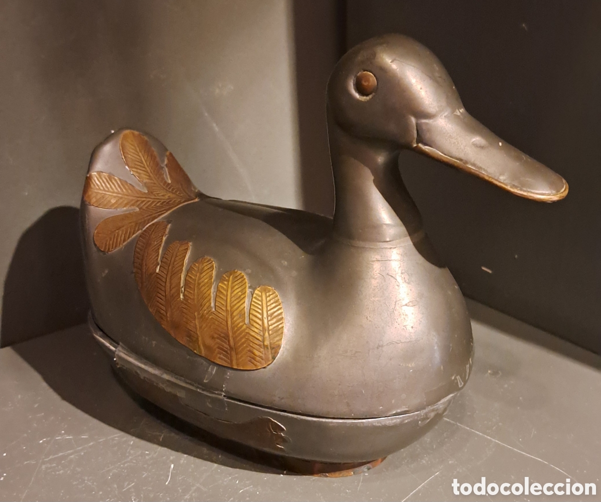 Figura Pato bronce caja