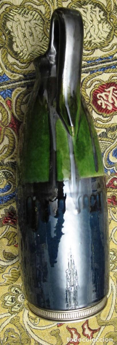 Antig&uuml;edades: BOTELLA DE CER&Aacute;MICA VERDE CON LA BASE DE PLATA - Foto 1