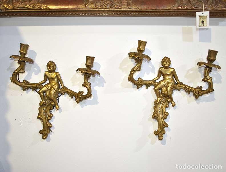 Antig&uuml;edades: PAREJA DE APLIQUES ANGELITOS DE BRONCE - Foto 1