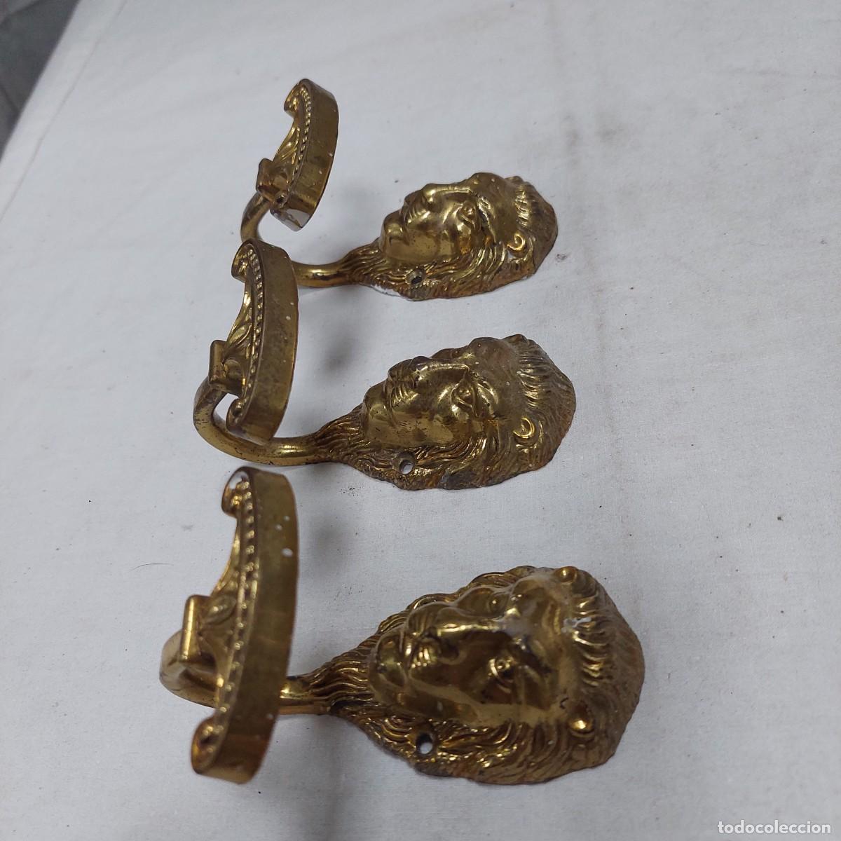 Antig&uuml;edades: 3 alzapa&ntilde;os bronce cabeza le&oacute;n. - Foto 1
