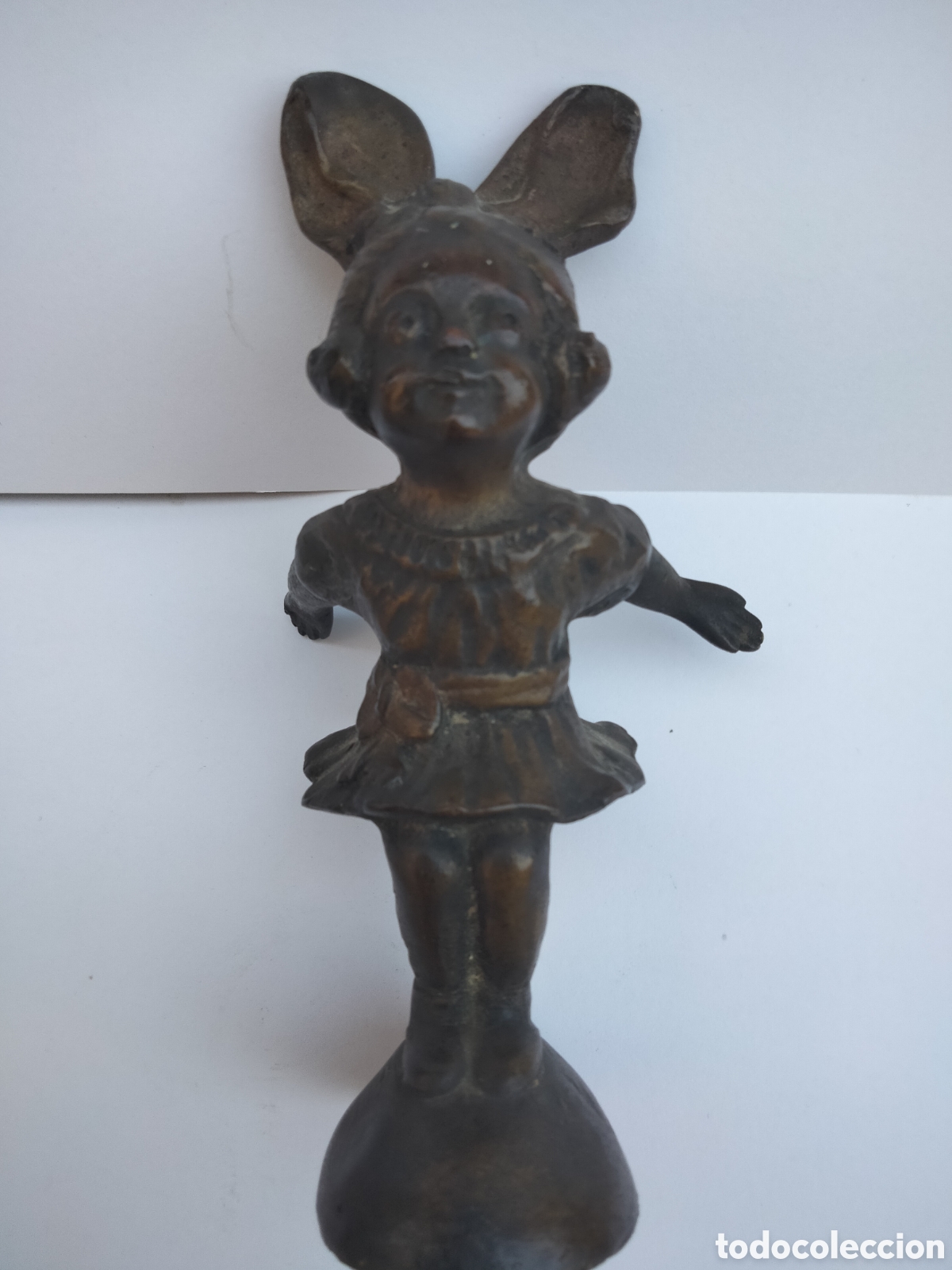 Antiquit&auml;ten: Mascota Nini. artista M.Bertin ,Emblema coche 20s, tapon radiador, bronce, firmada