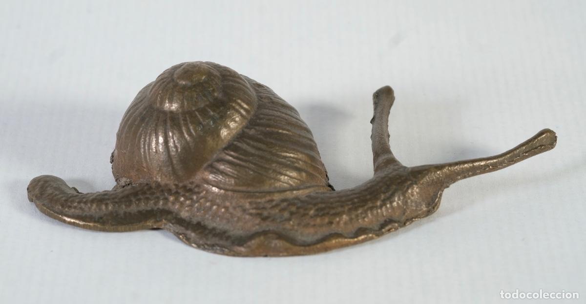 Antiguidades: Caracol en metal siglo XIX