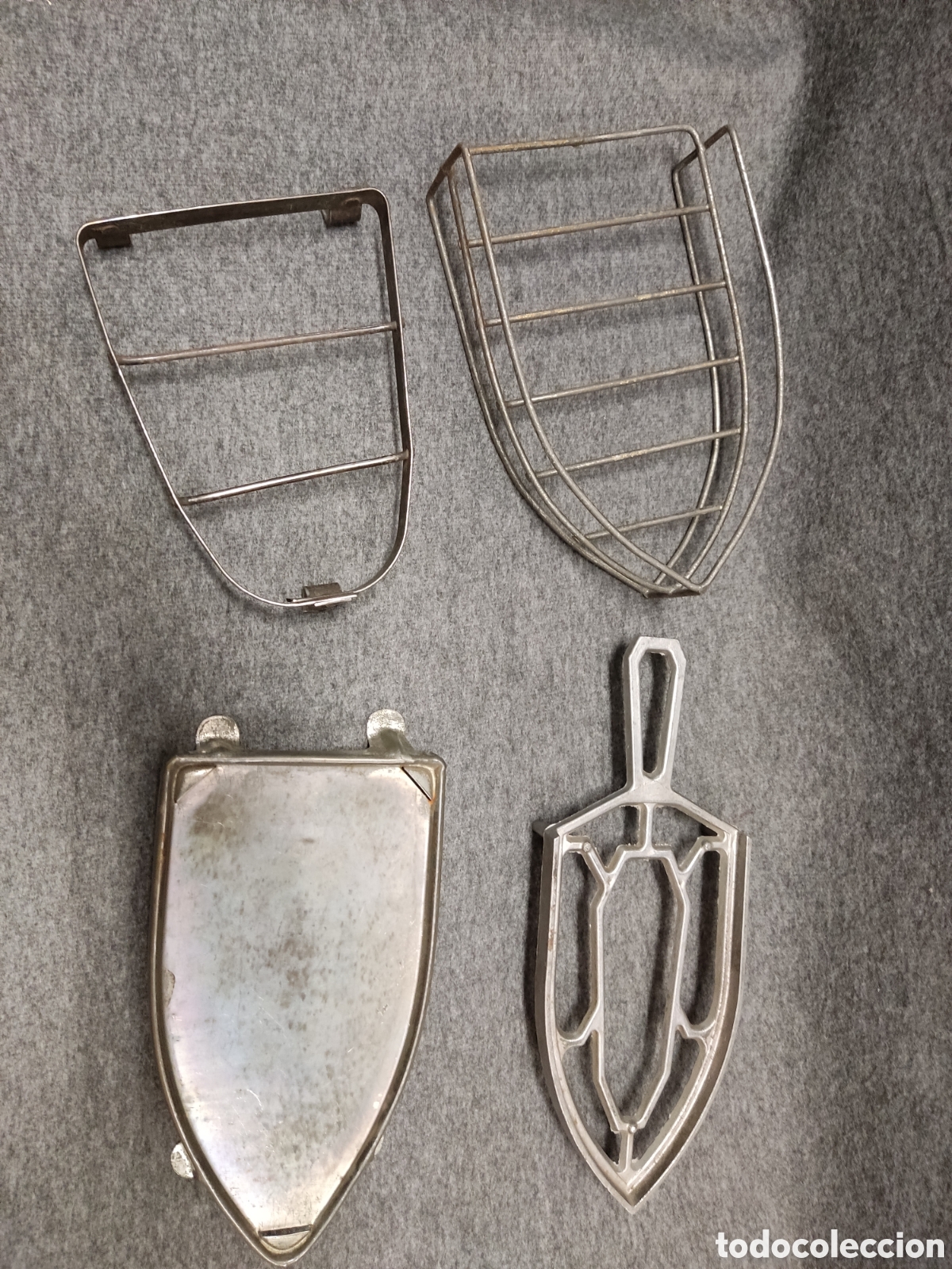 Antig&uuml;edades: Lote soportes plancha - Foto 1