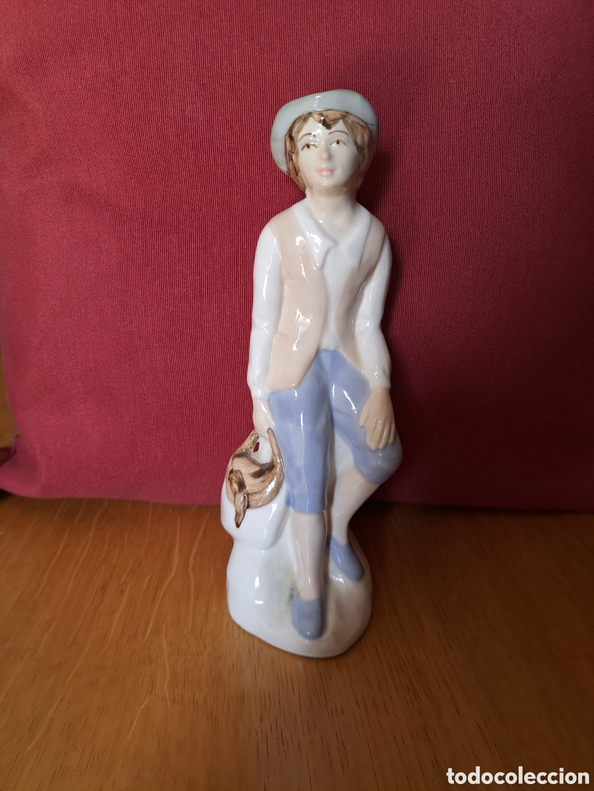 Antig&uuml;edades: Figura de ni&ntilde;o con cartera de Lladr&oacute; - Foto 1