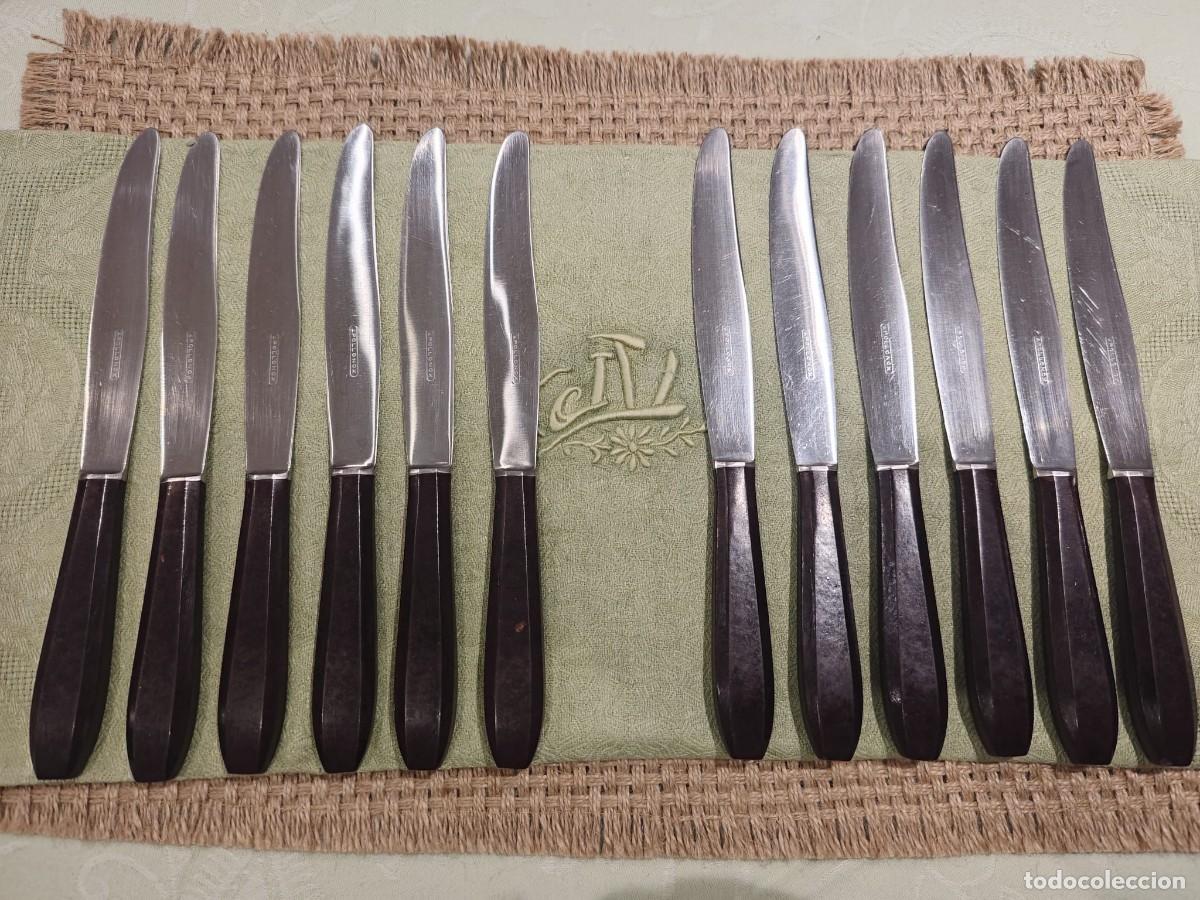 Antig&uuml;edades: 12 cuchillos de mesa mango baquerita - Foto 1