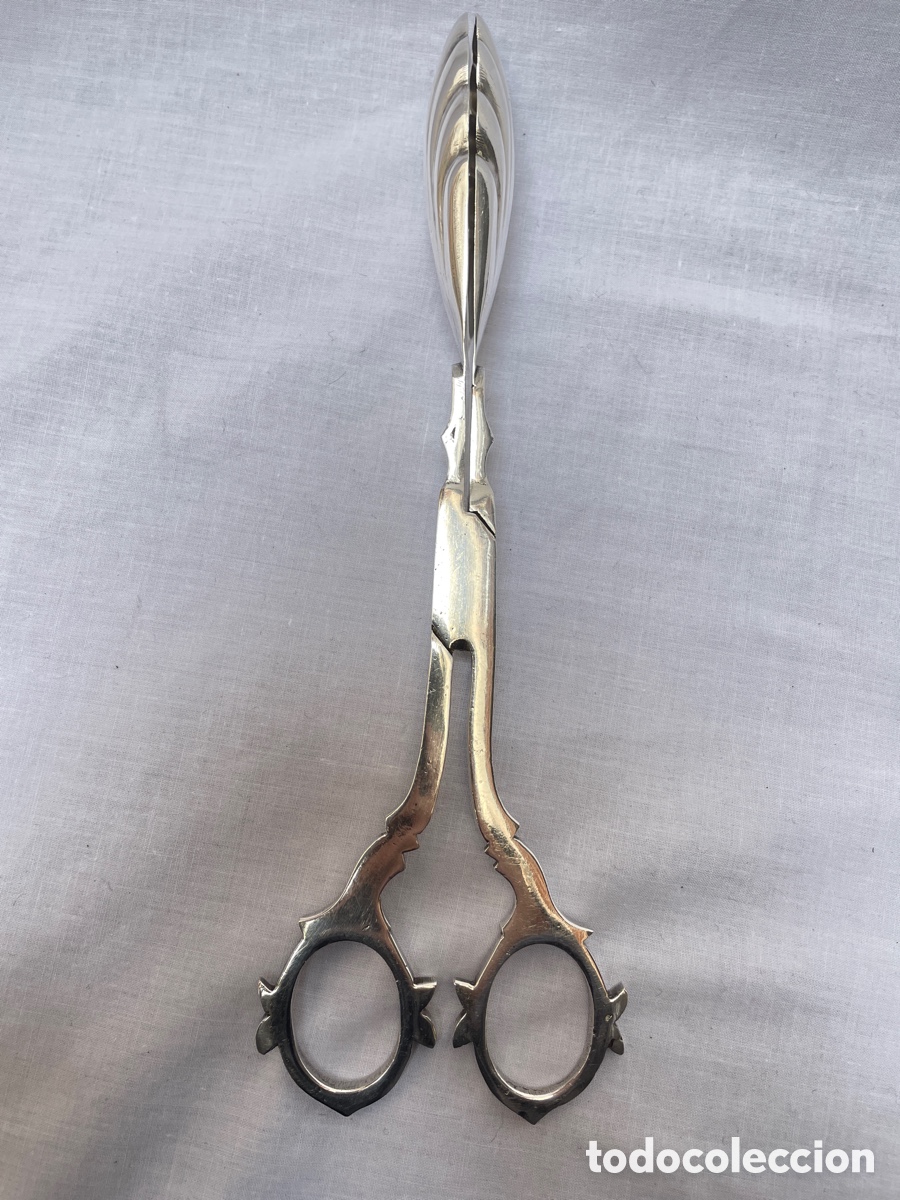 Antig&uuml;edades: Pinza de servir plateada Meneses de 27 cm - Foto 1