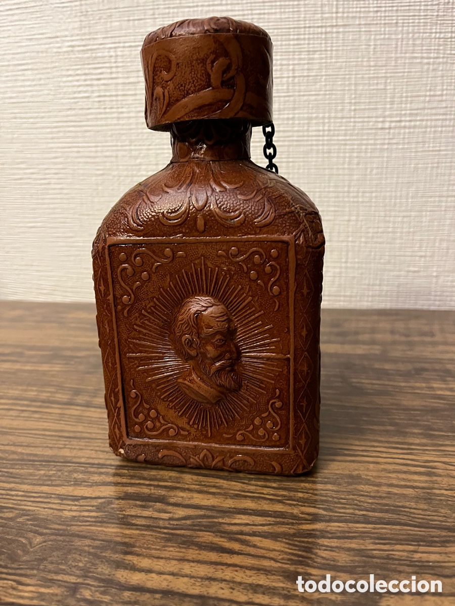 Antig&uuml;edades: Antigua botella forrada de cuero - Foto 1