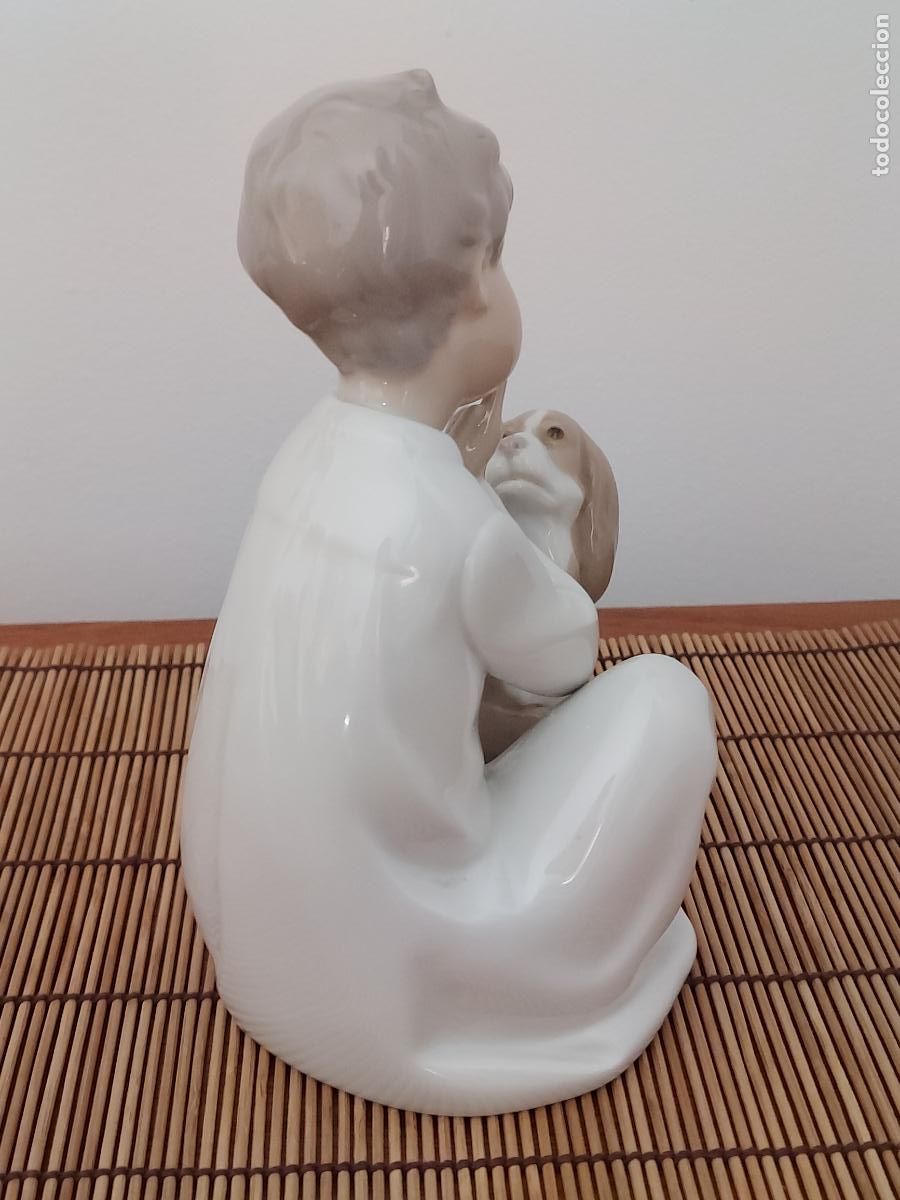 Antig&uuml;edades: Porcelana Lladr&oacute; ni&ntilde;o con perro - Foto 7