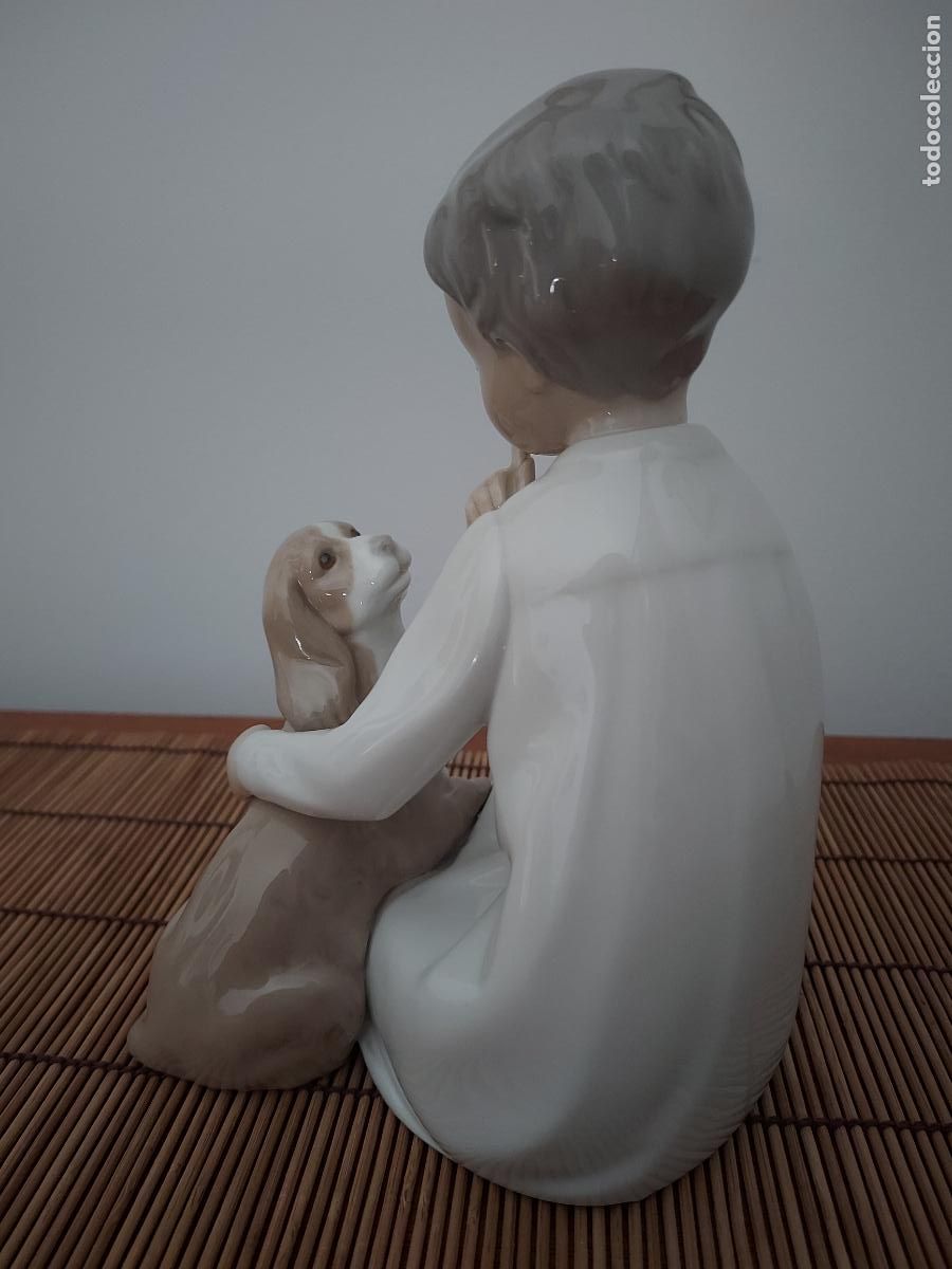 Antig&uuml;edades: Porcelana Lladr&oacute; ni&ntilde;o con perro - Foto 11
