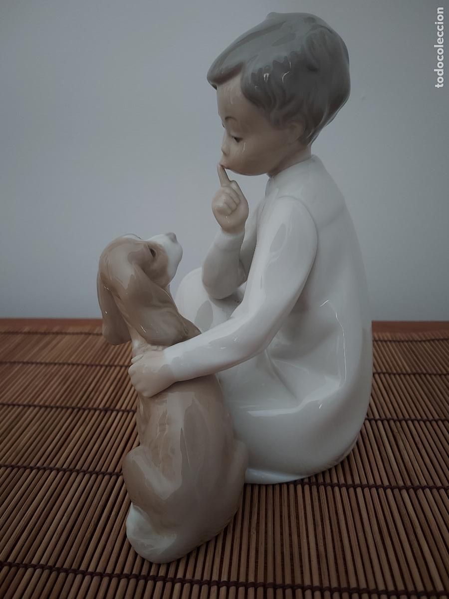 Antig&uuml;edades: Porcelana Lladr&oacute; ni&ntilde;o con perro - Foto 12