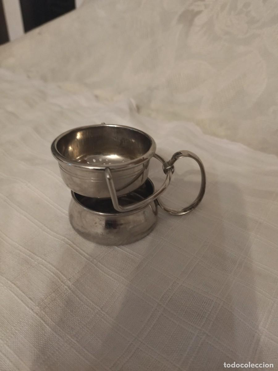 Antig&uuml;edades: Colador de t&eacute; giratorio de inox. - Foto 1