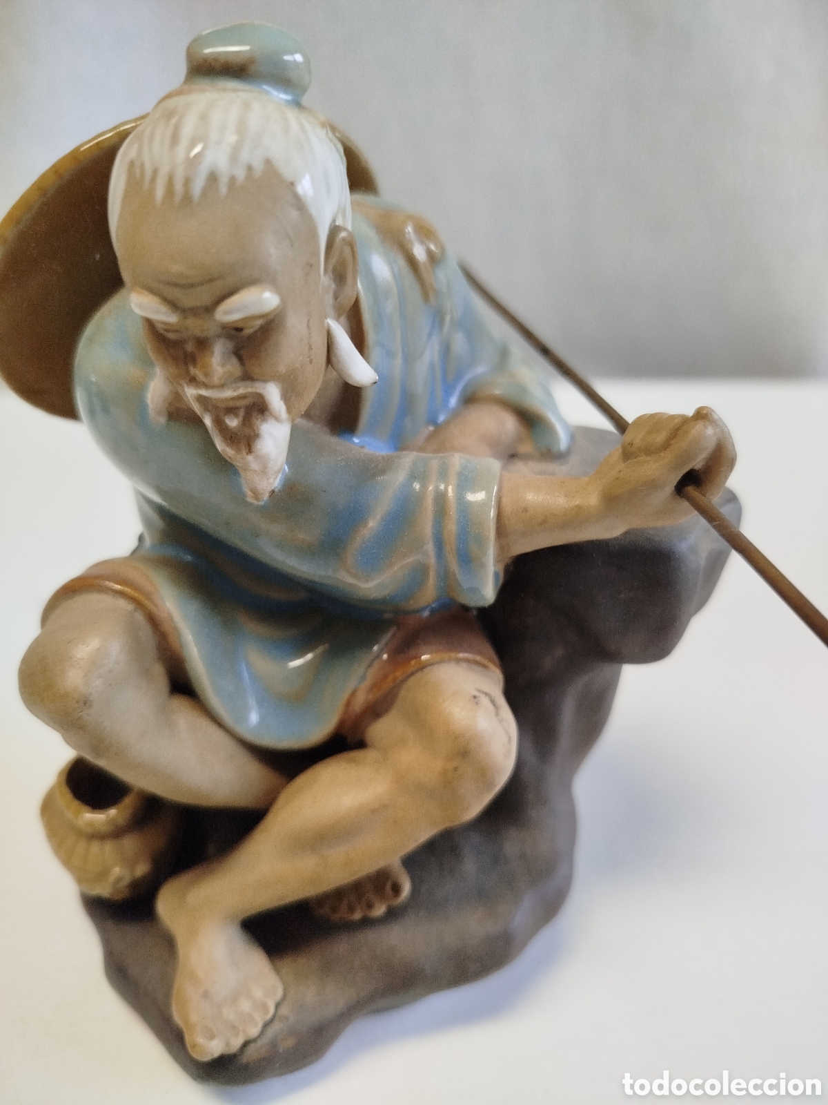 Antiques: Pescador chino en gres porcel&aacute;nico de Shiwan