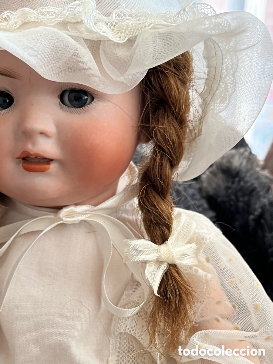 Antig&uuml;edades: Mu&ntilde;eca porcelana (articulada) pelo natural
