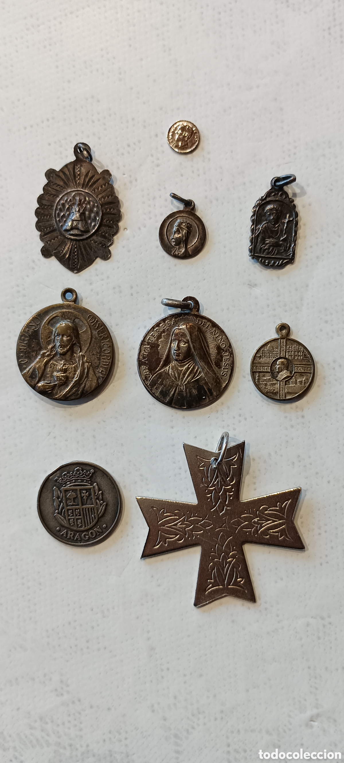 Antig&uuml;edades: Medallas religiosas (9 un.). De metal - Foto 1
