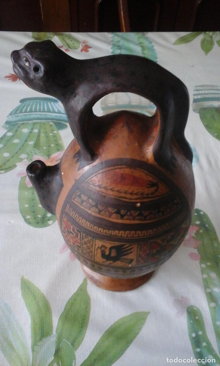 Antig&uuml;edades: quinque de terracota jaguar