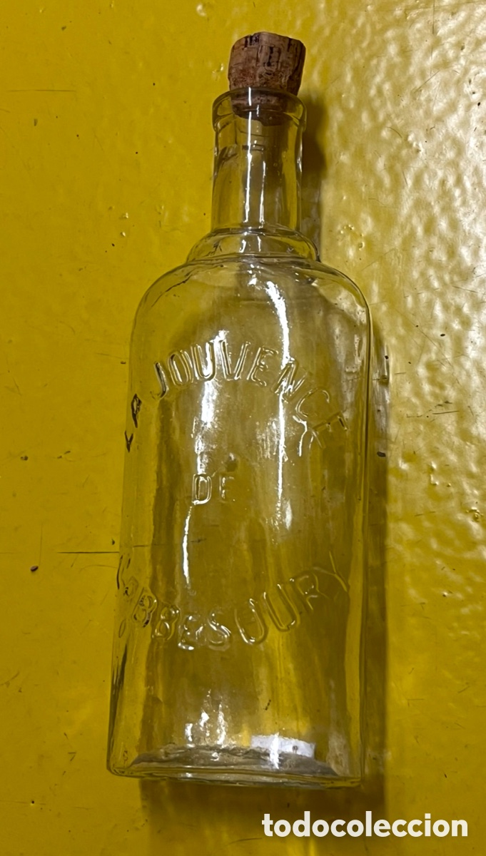 Antig&uuml;edades: Antigua botella de cristal. La Jouvence de Cabbesoury. Par&iacute;s. Mid-Century.
