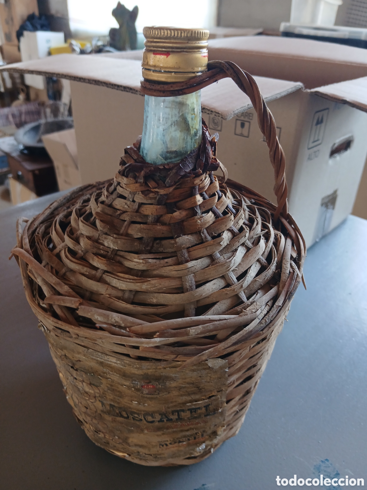 Antig&uuml;edades: GARRAFA DE CRISTAL RECUBIERTA DE MIMBRE - Foto 1