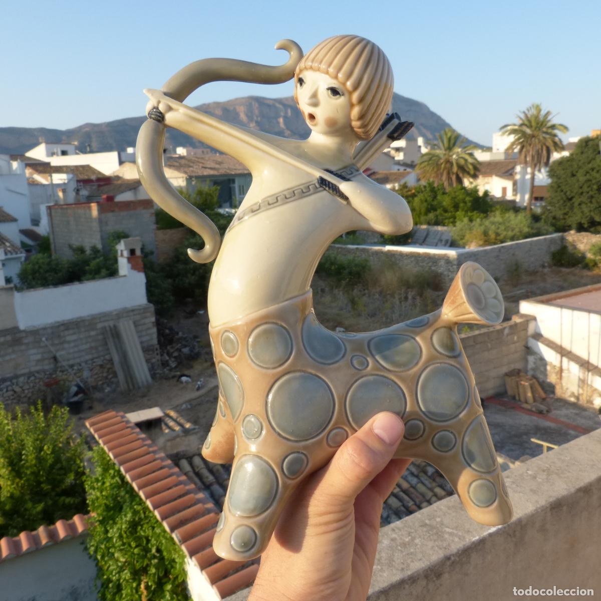 Antiques: Preciosa figura de porcelana, Sagitario, muy buen estado. 1162gr, 28cm.