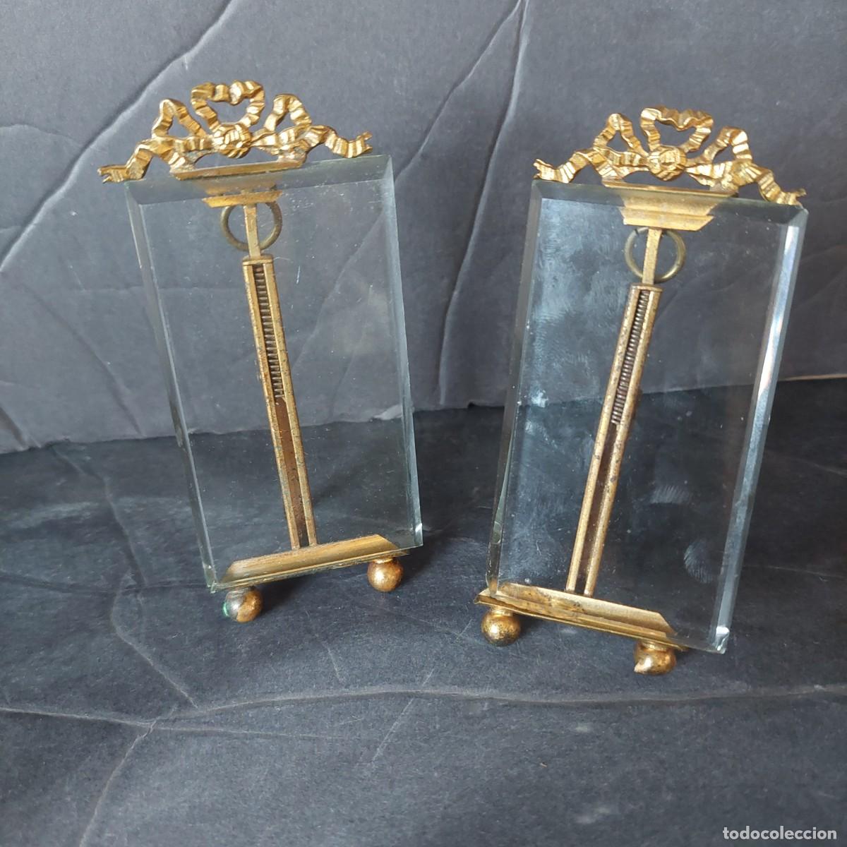 Antig&uuml;edades: Pareja de marcos portaretratos pp.S.XIX De cristal biselado y metal dorado