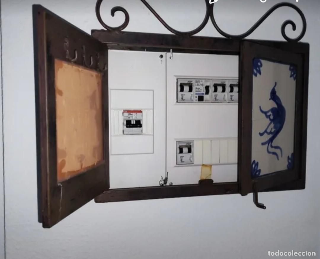 Antiguidades: Tapa de contador el&eacute;ctrico en forja