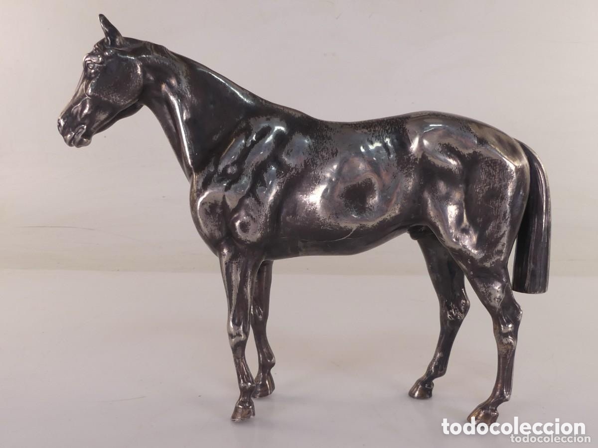 Antiguidades: Escultura de caballo